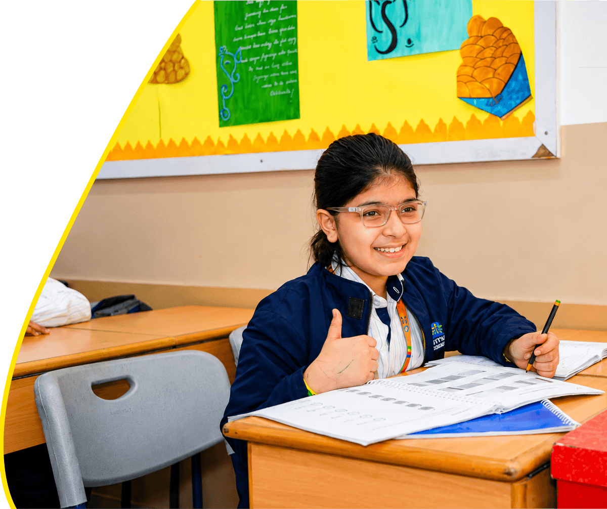 TLS students in front of the school building — admissions open